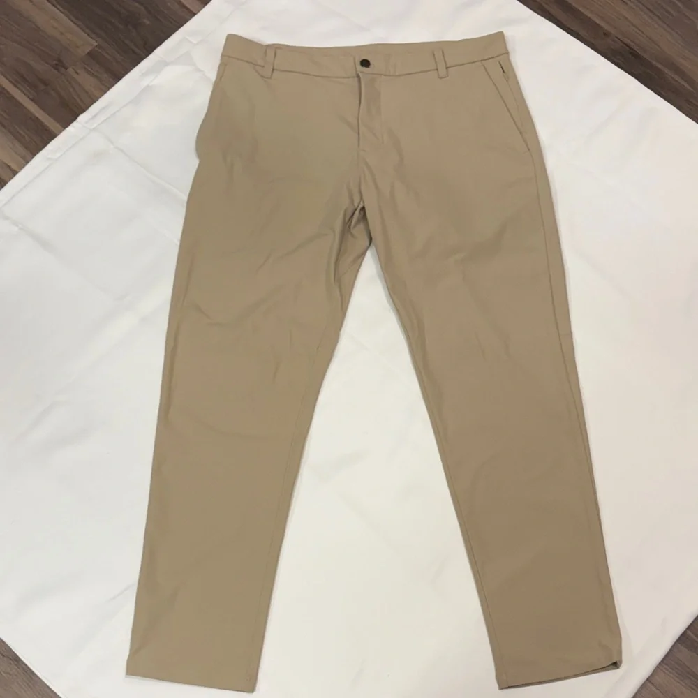 LULULEMON SLIM-FIT TROUSER SIZE 36 WARPSTREME.